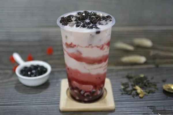Biến tấu trà trái cây nhiệt đới với Trà Việt Quất Macchiato đỉnh cao 2 tra viet quat matchiato